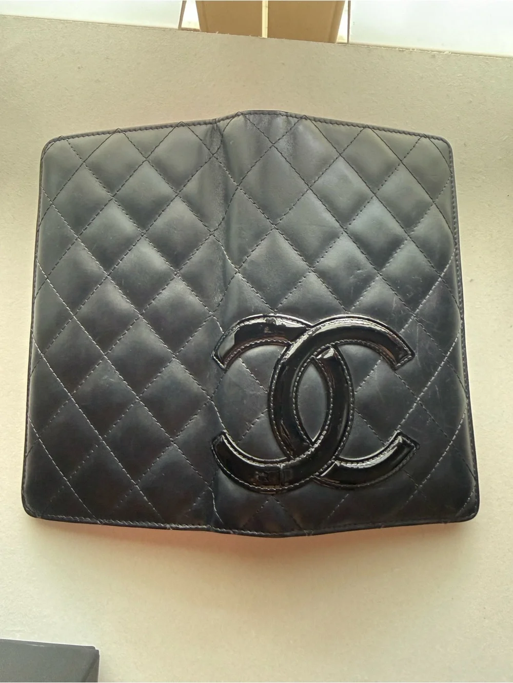 CHANEL Black Quilted Patent CC Phone Case
